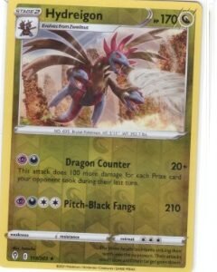 Hydreigon Pokémon card from the Evolving Skies set, specifically numbered 115/203.It is a Rare Reverse Holo version,