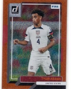 2022-23 Panini Donruss FIFA #173 soccer card featuring Tyler Adams of the United States.