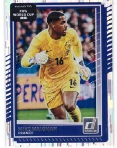 Panini Donruss Calcio trading card featuring goalkeeper Mike Maignan in a yellow jersey.